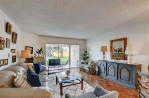 Photo of 3755 Via Poinciana #107, Lake Worth, FL 33467 (MLS # R11074358)