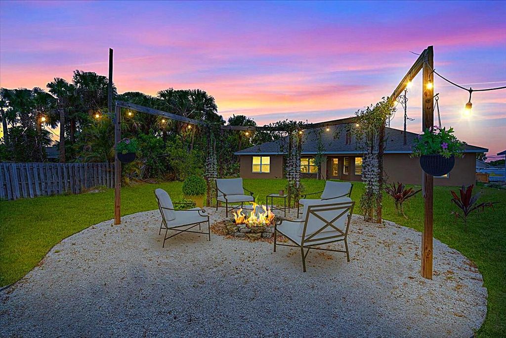 Photo of 3925 SW Helmlinger Street, Port Saint Lucie, FL 34953 (MLS # R11110826)