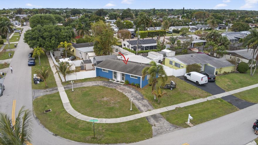 Spacious No-HOA Living on a Prime Corner Lot! This one level CBS single-family home offers 3 bed, 2 bath, and the freedom of no HOA restrictions. Situated on a large corner lot with circular driveway, the property features a storage shed, fully fenced yard with plenty of room for a boat, trailer, or RV—perfect for outdoor enthusiasts. Inside, you'll find an open-concept layout centered around a large kitchen island, ideal for entertaining and everyday living. The split-bed floor plan provides both comfort and privacy. Conveniently located just minutes from I-95 and Florida Turnpike, this home offers easy commuting while being close to public golf courses, beautiful beaches, shopping, and fine/casual dining options. This property combines lifestyle, location & flexibility - all in one!