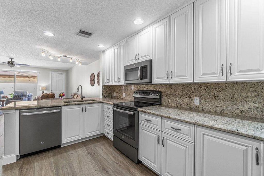 Photo of 4506 S Illicium Drive W, Palm Beach Gardens, FL 33418 (MLS # R11004748)