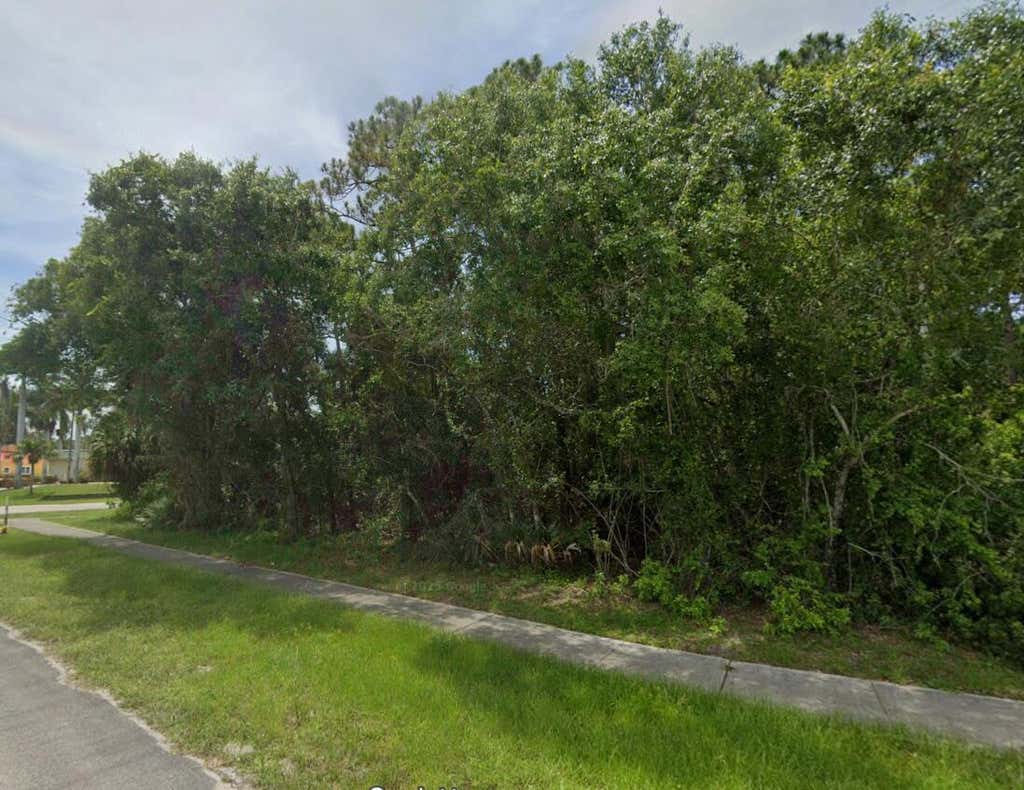 Photo of 308 E Midway Road, Fort Pierce, FL 34982 (MLS # B26056856)