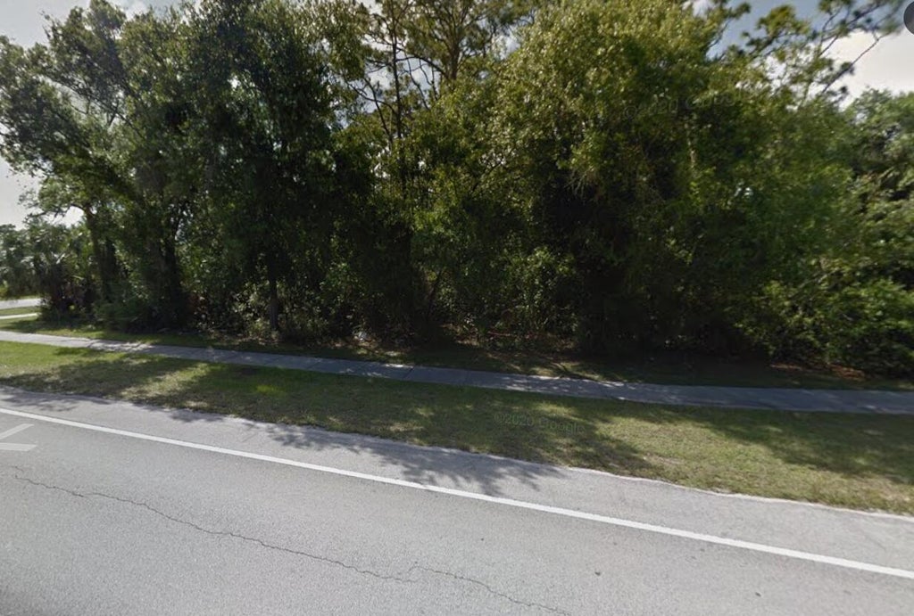 Photo of 308 E Midway Road, Fort Pierce, FL 34982 (MLS # B26056856)