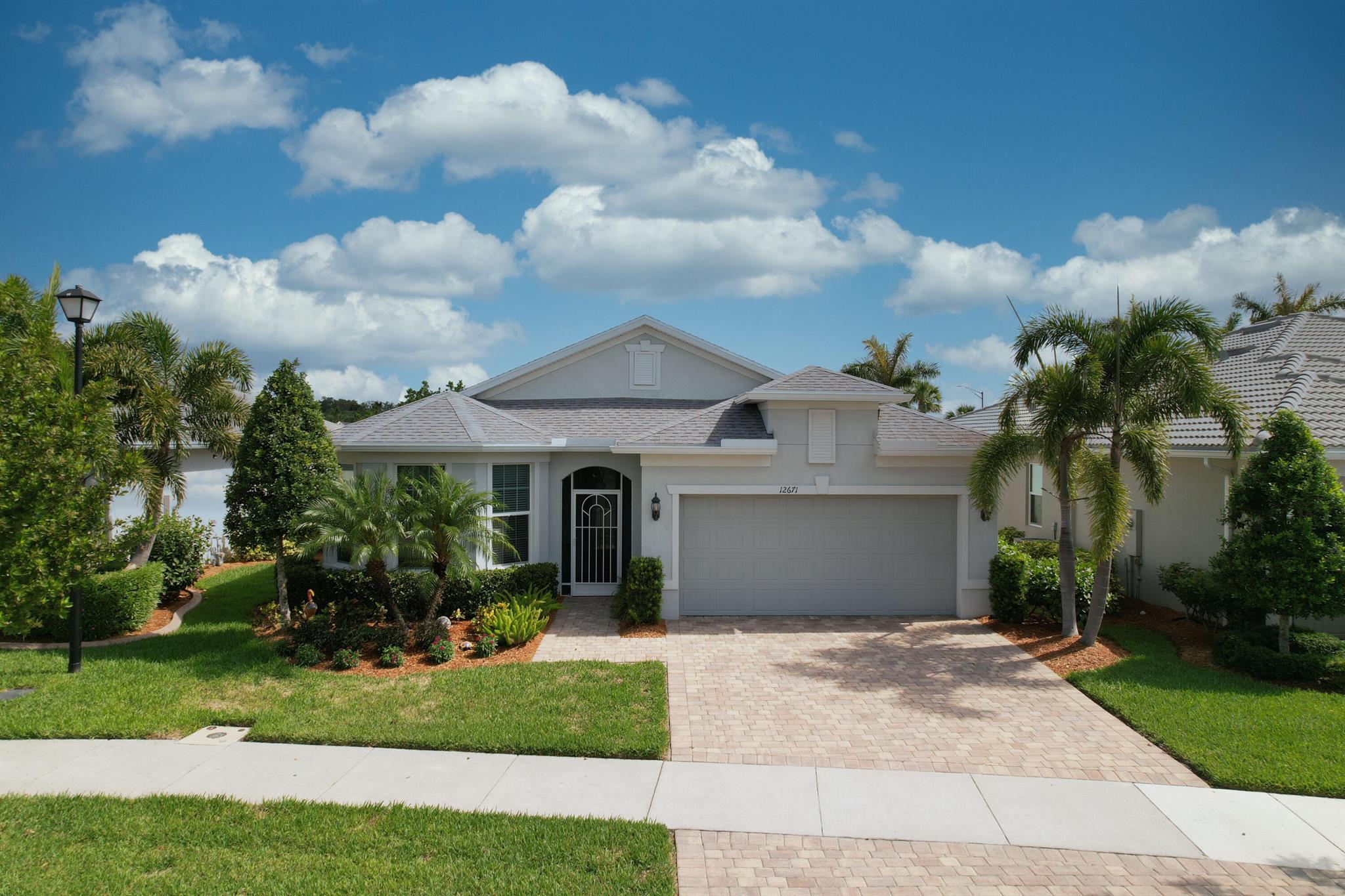 Gorgeous Extended Summerwood Model Pool Home in Del Webb at Tradition. Why wait to build when this home is ready to move into. Huge Open Floor Plan. This 3 bedroom plus den home boasts an upgraded kitchen with built ins, extended island, pull out drawers and large pantry. The Great Room is perfect for entertaining. The Master bedroom is so inviting with a decorative accent wall along with a Master Bath that has a wall with shiplap and custom mirrors over the dual sinks. Enjoy peace while relaxing on your screened patio and pool area. Fenced backyard perfect for pets. Active 55+ Community with Lifestyle Director, 2 Pools, Gym, Pickleball, Bocce, Tennis, Walking Trail, Dog Park and lots of clubs and shows to enjoy.