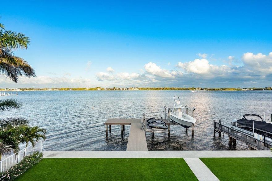 2505 North Lake Dr. Boynton Beach – An incredible brand new coastal contemporary intracoastal estate boasting elegance, clean lines, walls of floor to ceiling glass with unobstructed direct Intracoastal Waterway views on one of the widest sections of intracoastal in all of Palm Beach County. A true trophy property, this intracoastal estate encompassing 6432 total square feet, stretches 80' of waterfront and is the ultimate location directly across from the inlet and ultra-exclusive Manalapan. World renowned architect Randall Stofft and builder Varga Homes created an extremely well thought out floor plan embracing the best wide water views from every angle. Upon entering, catch your breath as walls of glass reveal the wide intracoastal, pool and expansive private back yard with synthetic turf.  Interior highlights include 1 guest suite downstairs, oversized club-room, and an open floor plan that blend the epitome of modern luxury living and wide-open entertaining spaces in perfect balance. On the 2nd floor you find 2 additional private bedroom suites, a giant owner's suite that features a dream bathroom with freestanding tub, steam shower, ample closet space and a large private balcony with postcard views. Interior luxury finishes include stunning 35" porcelain tile floors, quartzite counter-tops, custom ceiling details with multi-level cove and light accents, custom lighting and sound system and lighted fireplace. Outside a giant covered lanai, a fully covered outdoor kitchen and tropical setting all combine to make this a truly magnificent private paradise. For the waterfront and boating enthusiast, highlights include a brand new custom extended "T" dock that features a remote controlled 20K lb 4 post boat lift, Jet Ski / kayak lift platform, a newly built elevated seawall that is capped and batter pilled. Additional features include all impact windows and doors, Thermador natural gas appliances, 2 car garage with room for lifts to convert to 4 car, mud room and prewired for a backup power generator. This home was designed and built beyond expectations for many future generations to enjoy the epitome of the South Florida lifestyle, watching the boats go by, stingrays and manatee gliding by your own private dock, paddling out on your paddle board, watching the birds of prey diving on fish. Please call for details.