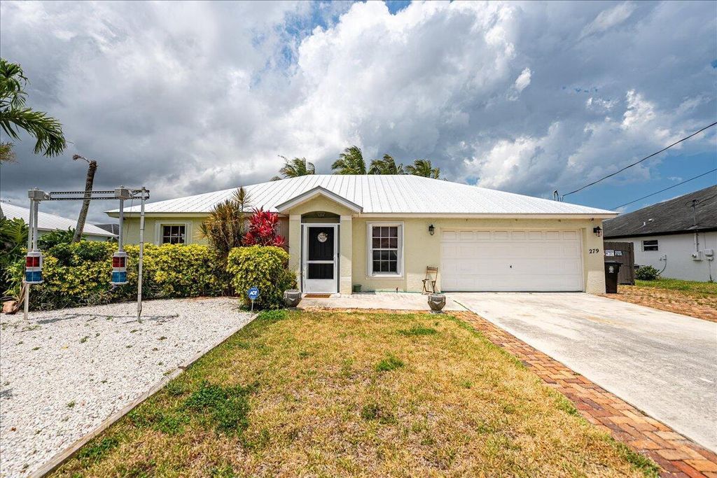 Photo of 279 SW Glenwood Drive, Port Saint Lucie, FL 34984 (MLS # B26028018)