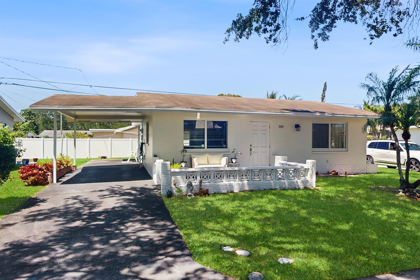 Enjoy quiet, private living in this charming 2 bed, 1 bathroom home on a spacious corner lot. Wake up to beautifully landscaped surroundings and sip your morning coffee in the peaceful front or back patio. With a 3 car carport, there's plenty of space for guests! Complete with fresh paint, partial impact windows, newer roof, new AC, AND new water heater, you will enjoy comfort year round. Conveniently located, you'll have everything you need just minutes away! Add your personal touches to complete your next home!