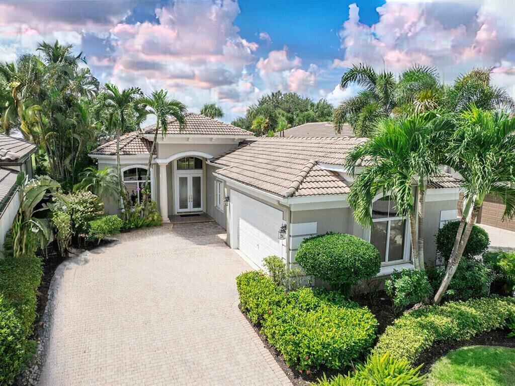 Addison Reserve - Stunning contemporary Chateau model featuring 3 beds + office/den, 3.5 baths, 2.5 garage & 2935 sf of living space w/ heated pool & golf course views. Open floor plan, 24' white porcelain flooring, gourmet kitchen w/ SS appliances, quartz counters, custom pantry, pull outs, wine cooler & large center island w/ new modern lighting throughout. Custom entertainment center w/ floating shelves, surround sound, volume ceilings & electric blinds. Redesigned primary suite offers custom dual closets w/ a wall of drawers & additional storage in the hallway to maximize space. Enjoy a spa like bath w. a custom free standing tub, state of the art shower & dual vanity areas. Heated pool, artificial grass, amazing golf views, fenced yard & accordion shutters. PARTIAL GOLF MEMBERSHIP.