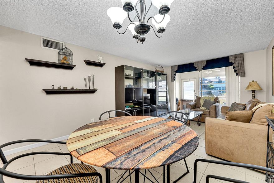 Rarely available 1BR/1BA first-floor corner unit featuring a brand-new walk-in shower and a bright white kitchen. This clean, comfortable home offers easy access, great natural light, and a layout that feels larger than expected. Association budget looks great! Perfect opportunity for a buyer looking for value—seller is actively seeking offers. The unit includes a service contract, which is covered under the low monthly maintenance. The Low Monthly fee includes: Water, Insurance, Building exterior, Pool, Club house, Maintenance contract and so much more!