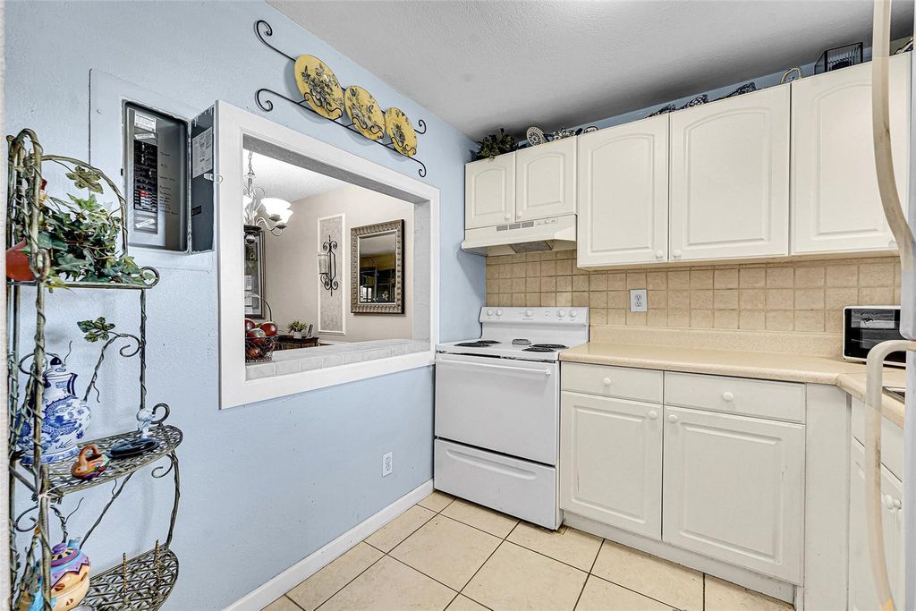 Photo of 9041 Sunrise Lakes Boulevard #101, Sunrise, FL 33322 (MLS # F10551162)