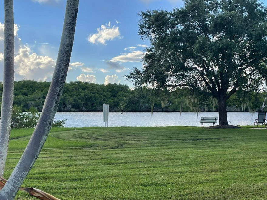 Beautiful water view in desirable Riverland Mobile Home Waterfront Co-Op Community!  2 Bed 1 Bath and 1/2 Bath in this active 55+neighborhood.  Plenty of space to park. Furnished, New water heater, Recently Roof sealed & painted. All Duct work replaced. Newer AC. No flood insurance required. Community includes clubhouse, shuffleboard, social activities and heated pool. HOA fee includes water, sewer, landscaping, and basic cable/internet.  Community conveniently located near river, beaches, dining and shopping.  Community also offers optional boat dockage.   Golf Cart included with full price offer.