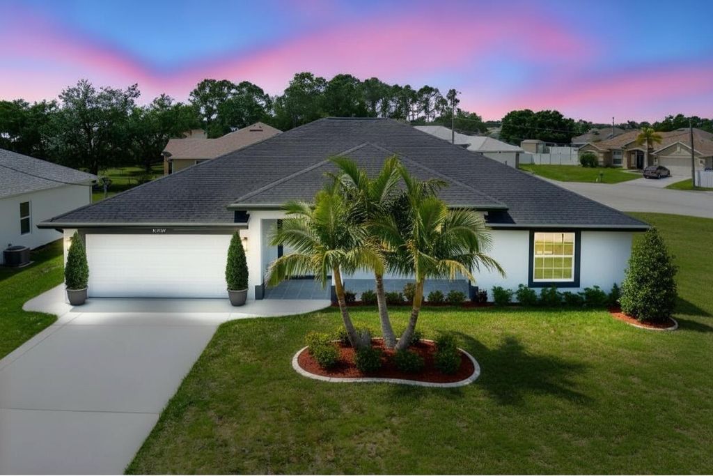 Photo of 5360 NW Akbar Terrace, Port Saint Lucie, FL 34986 (MLS # B26000555)