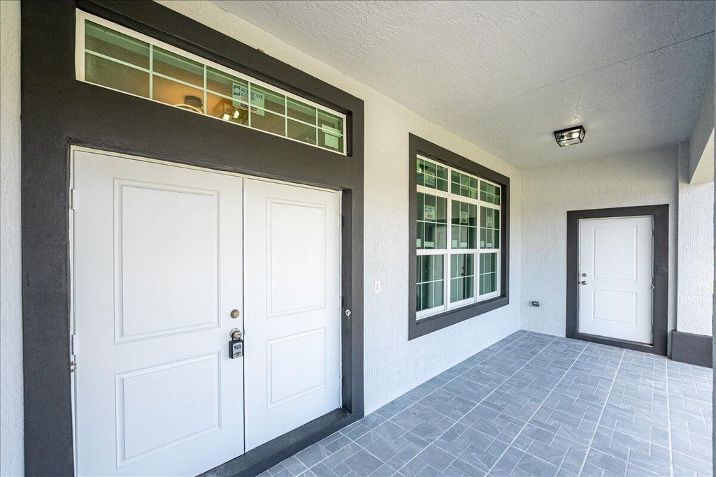 Photo of 5360 NW Akbar Terrace, Port Saint Lucie, FL 34986 (MLS # B26000555)