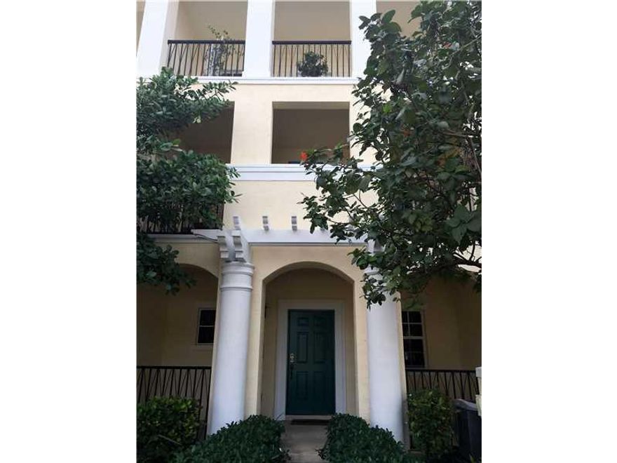 Everyone loves a deal! Orchid Grove's Best Value! Two miles to beach at this price...nowhere else! Great condition. Unlike others, this offers a 2 car garage, 2 large balconies, front door parking, & 500 MORE SQ.FT.! Resortlike living !Shops & restaurants  a block away! Minutes from I95 & Fl. Turnpike! Spacious Tri-Level w 3 bedrooms, 2 full and 2 half baths, covered porch entryway, covered balconies off living room & master BR! Amazing Kitchen w/42inch cabinets. Master bath has separate tub and shower!