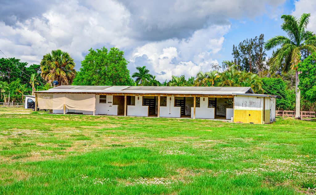 Photo of 8990 Willow Sound Drive W, Lake Worth, FL 33467 (MLS # R11126063)