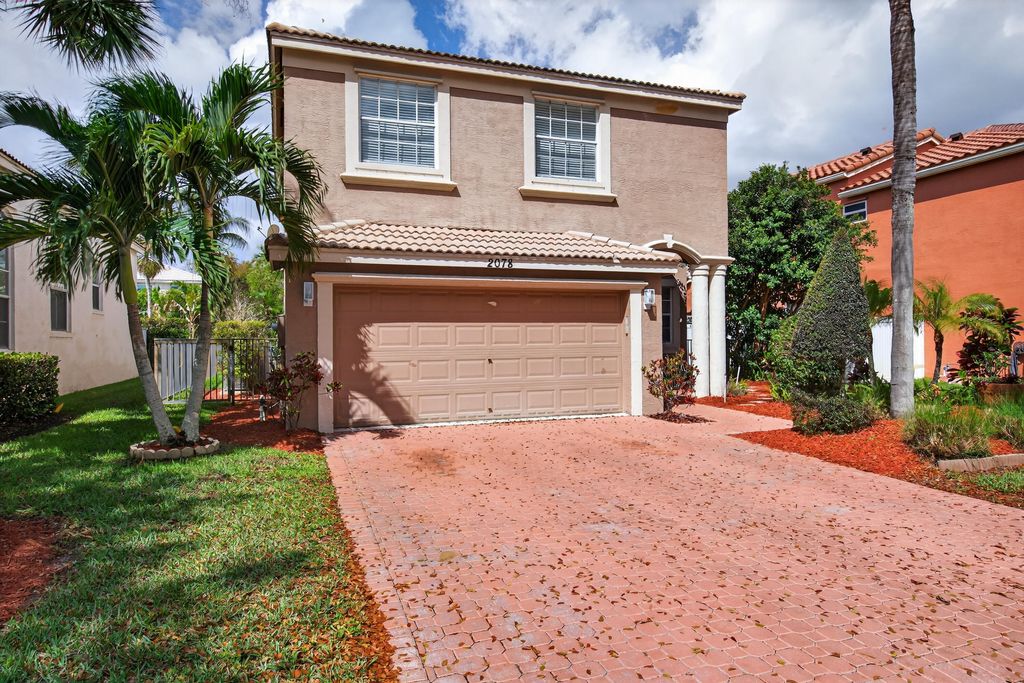 Photo of 2078 Reston Circle, Royal Palm Beach, FL 33411 (MLS # B26009150)