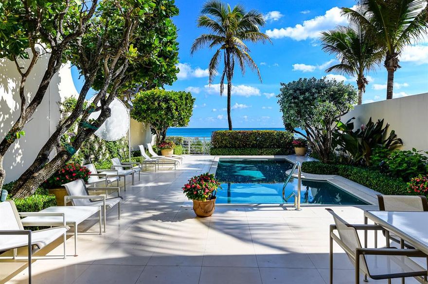 Rare Direct Oceanfront Offering. Revel in this 5700+/-square foot exquisitely designed townhouse with the finest custom finishes and interior appointments throughout. Skylights create a profusion of natural light and airy space. A Gracious Master Suite boasts impressively large dual dressing rooms and baths. There are several rooms that can be personalized for guests, media, fitness, office, & staff. Soaring ceiling heights on both levels, elevator, private pool & beach access, full house generator, abundant storage, and a 2 car garage. Pocketed impact glass doors showcase the breathtaking ocean views beyond. The Residences at Sloans Curve is a private gated enclave that offers the amenities of a 5 star resort with all the conveniences of living in a A+ managed community. Truly a Must See! See!