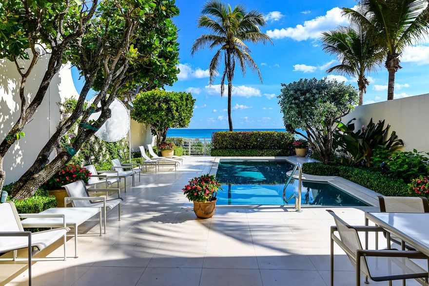 Rare Direct Oceanfront Offering. Revel in this 5700+/-square foot exquisitely designed townhouse with the finest custom finishes and interior appointments throughout. Skylights create a profusion of natural light and airy space. A Gracious Master Suite boasts impressively large dual dressing rooms and baths. There are several rooms that can be personalized for guests, media, fitness, office, & staff. Soaring ceiling heights on both levels, elevator, private pool & beach access, full house generator, abundant storage, and a 2 car garage. Pocketed impact glass doors showcase the breathtaking ocean views beyond. The Residences at Sloans Curve is a private gated enclave that offers the amenities of a 5 star resort with all the conveniences of living in a A+ managed community. Truly a Must See!