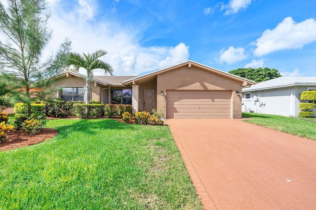 Photo of 9535 NW 82nd Street, Tamarac, FL 33321 (MLS # F10459505)