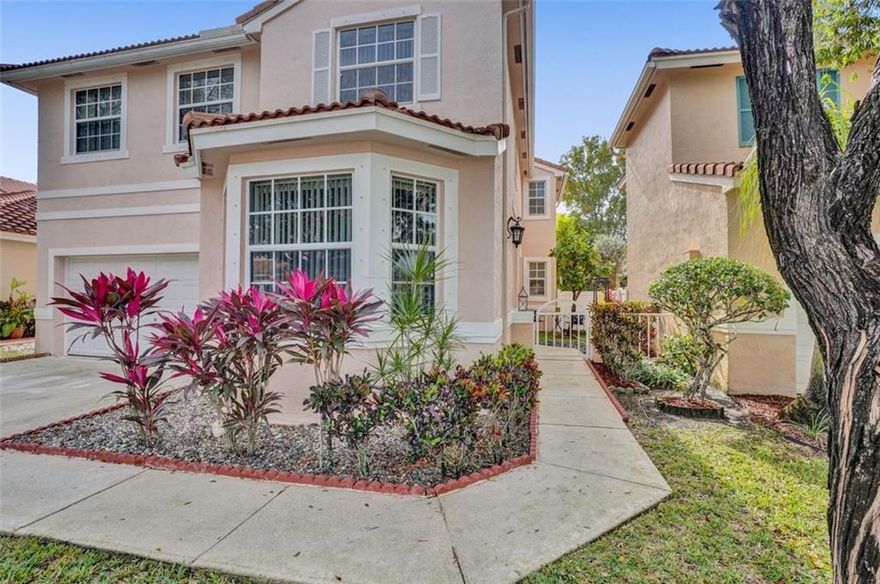 Pristine 4BD+Den home in a beautiful gated community. Authentic and well-cared-for home by the original owner. Enter through the private entry taking in the green beauty of a serene courtyard. Step inside a sun-filled home and fall in love with the comfortable open living space. The first floor includes dining room, bright family room great for entertaining, a den with french doors that can be easily converted to a bedroom, and a half bath, too! 4 spacious bedrooms upstairs. The primary bedroom suite invites in plenty of sunlight with a large walk-in closet and a bathroom with a separate shower and tub. Sizable fenced-in backyard, situated within the boundaries of the highly desirable Stoneman Doulas High School, community pool, outdoor fitness area, tree-lined green space. Low HOA fee