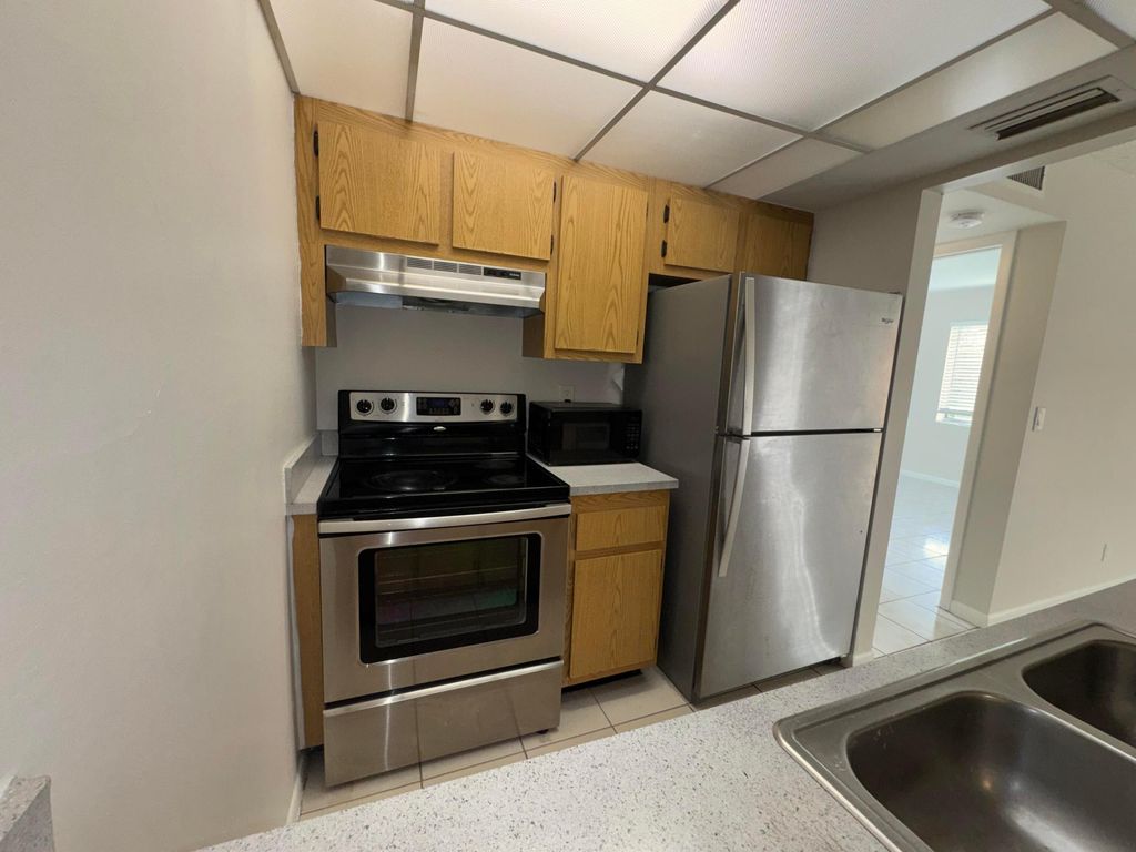 Photo of 1854 Abbey Road #102, West Palm Beach, FL 33415 (MLS # B26009170)