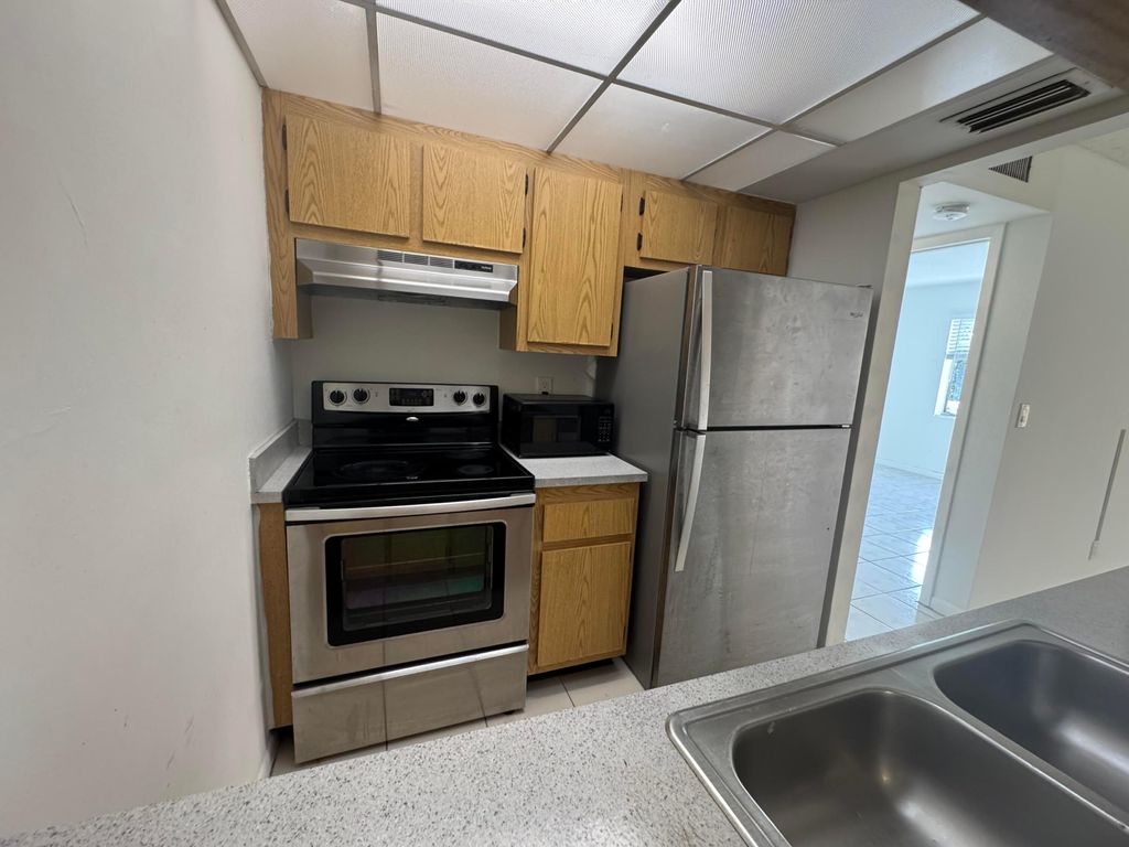 Photo of 1854 Abbey Road #102, West Palm Beach, FL 33415 (MLS # B26009170)