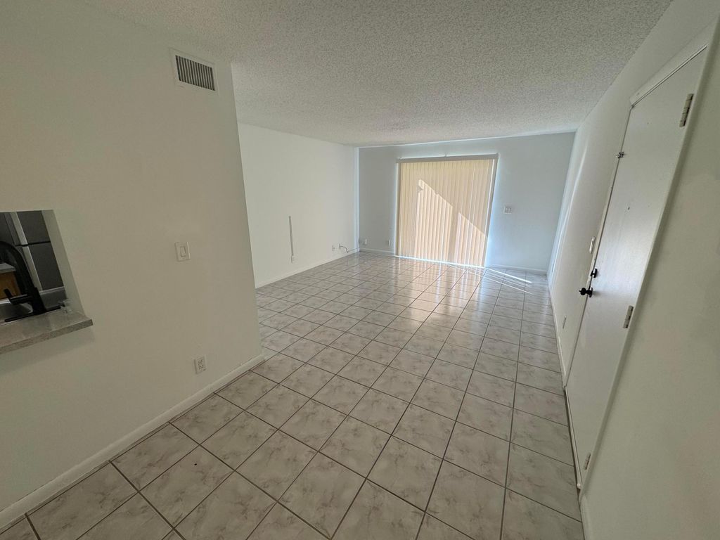 Photo of 1854 Abbey Road #102, West Palm Beach, FL 33415 (MLS # B26009170)