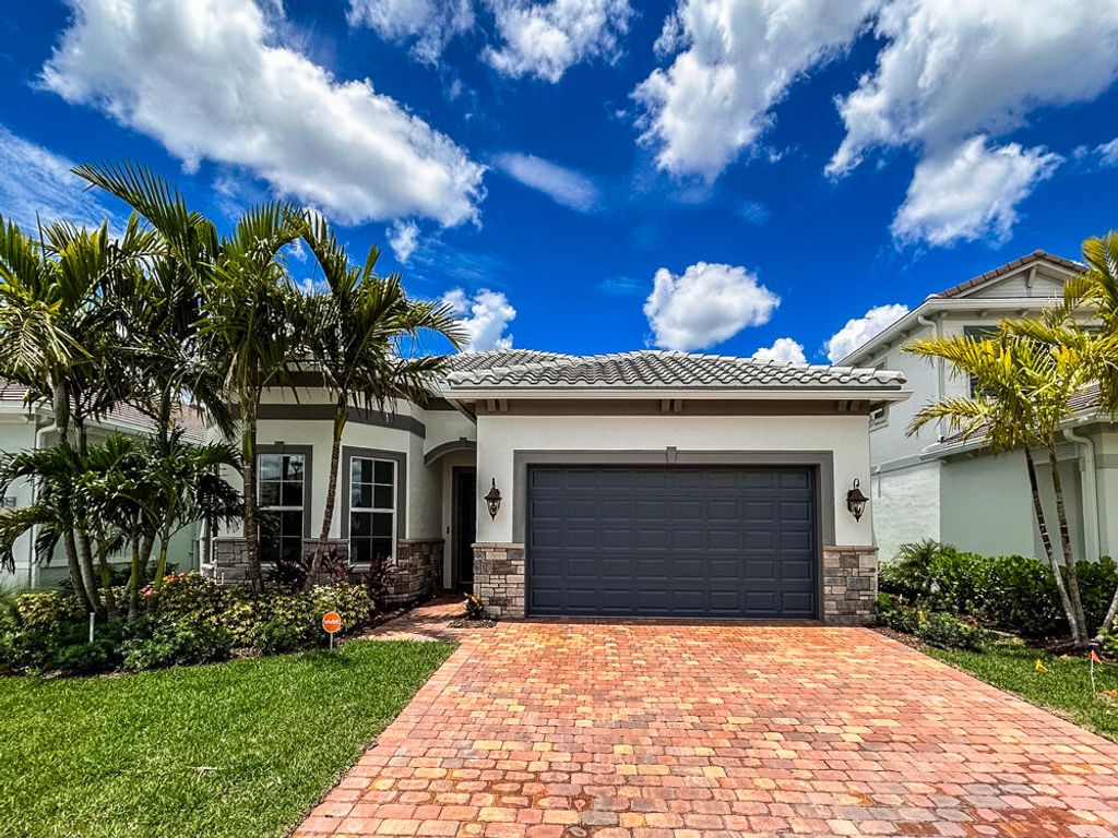 Photo of 12521 Triumph Lane, Palm Beach Gardens, FL 33412 (MLS # R10999378)
