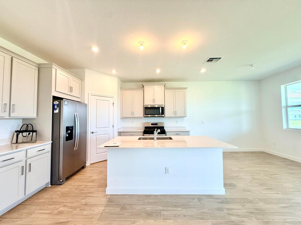 Photo of 14500 SW URBANE Way, Port Saint Lucie, FL 34987 (MLS # B26076248)