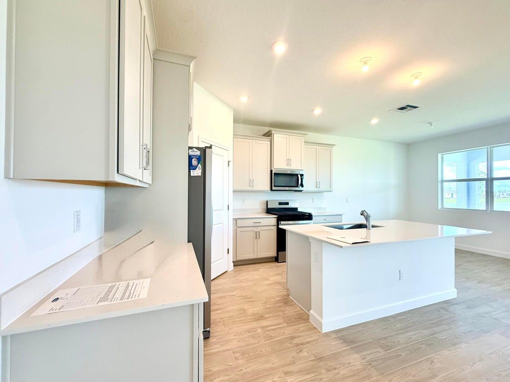 Photo of 14500 SW URBANE Way, Port Saint Lucie, FL 34987 (MLS # B26076248)