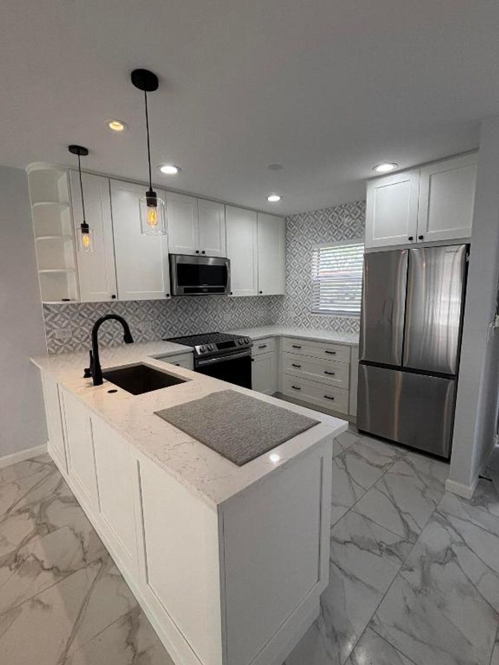 Photo of 12007 Poinciana Boulevard #108, Royal Palm Beach, FL 33411 (MLS # R11154345)