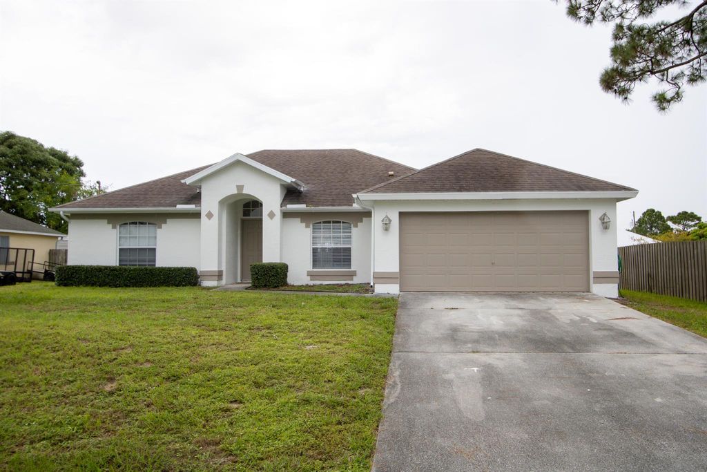Photo of 1293 SW Kalevala Drive, Port Saint Lucie, FL 34953 (MLS # R11017963)