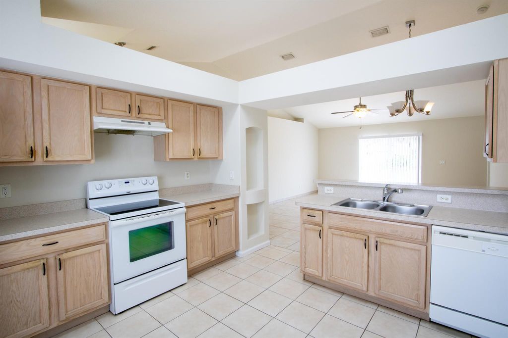 Photo of 1293 SW Kalevala Drive, Port Saint Lucie, FL 34953 (MLS # R11017963)