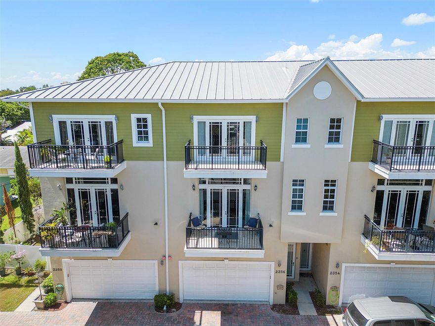 Wonderful Living at WILTON MANORS in this great size townhouse 3B/3.5B with 2,552 square foot. Open your door and walk in seconds to all the entertainment at Wilton Drive. Short-term rent allowed. Incredible sizes 12-foot-High ceilings on main living area, and 10 high ceilings in 1st & 3rd floor. Open layout kitchen with granite countertops and stainless-steel appliances, Walkin pantry. High Impact windows and doors for your protection, Balcony in living area ideal for coffee break & breakfast. The home comes with TWO super spacious MASTER SUITES, balcony in main suite and walkin closet, back patio deck. Double car garage with high impact door. Metalic roof in great condition and HOA takes care of it, few owners in building quick decisions, fast 1 week approval for new buyers, Easy to show