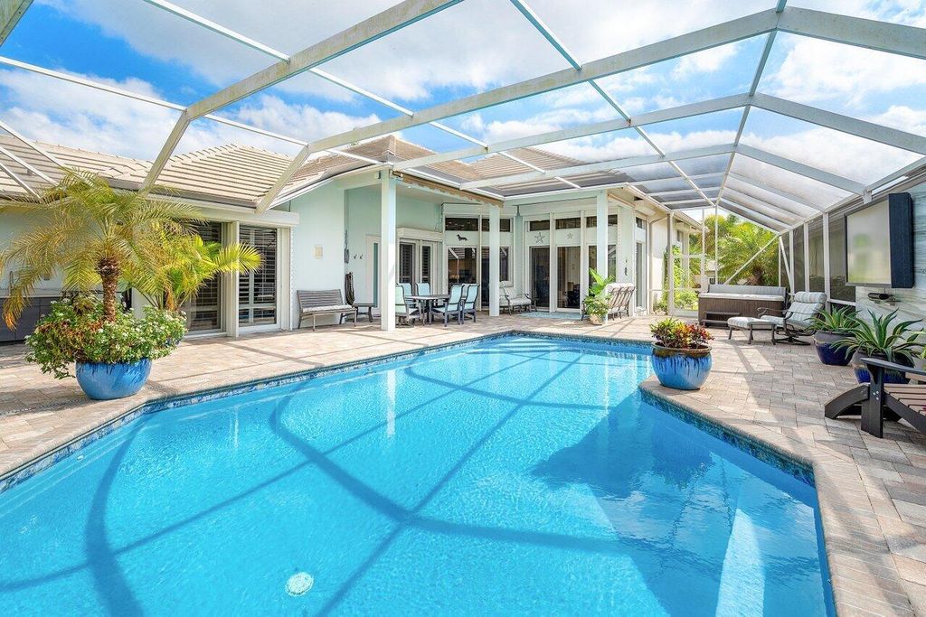 Photo of 185 Orange Tree Drive, Atlantis, FL 33462 (MLS # R10943309)