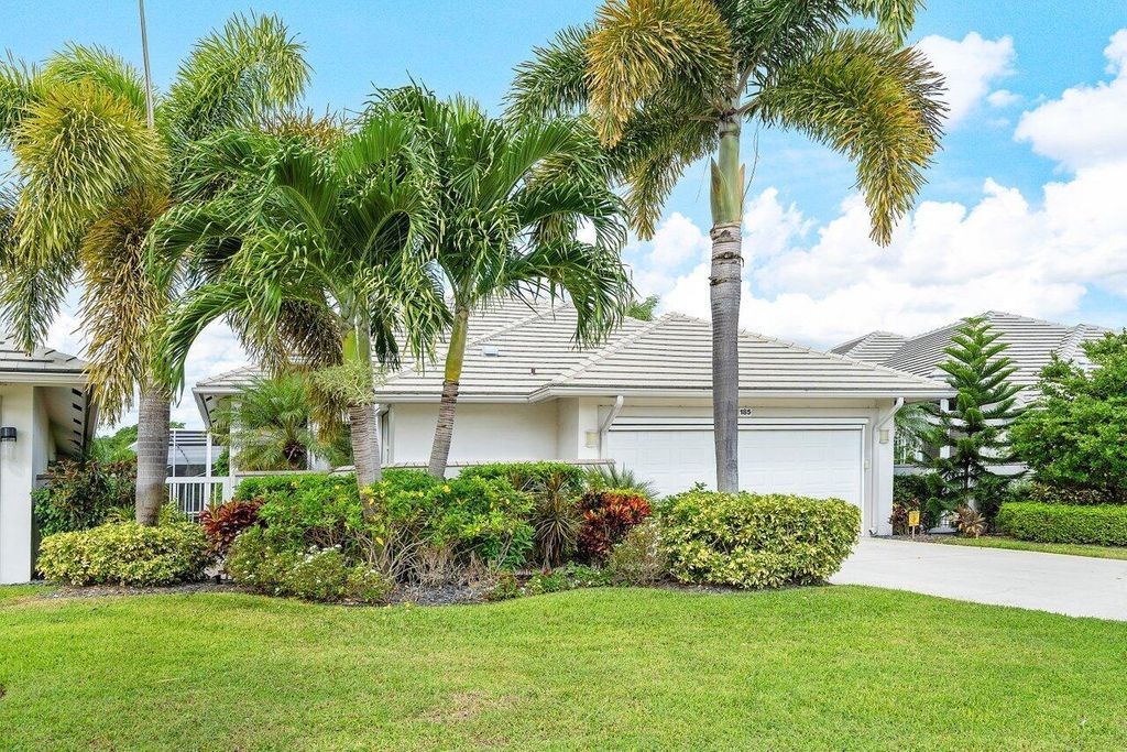 Photo of 185 Orange Tree Drive, Atlantis, FL 33462 (MLS # R10943309)