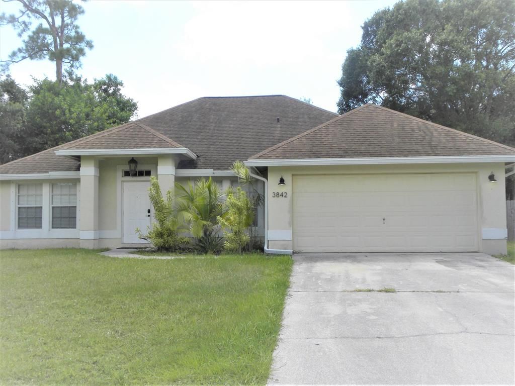 Photo of 3842 SW Ruark Street St, Port St Lucie, FL 34953 (MLS # R10825587)