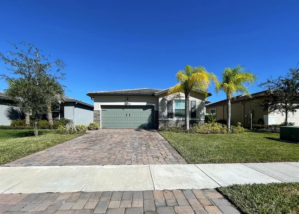 Photo of 12575 NW Toblin Lane, Port Saint Lucie, FL 34987 (MLS # R10762244)