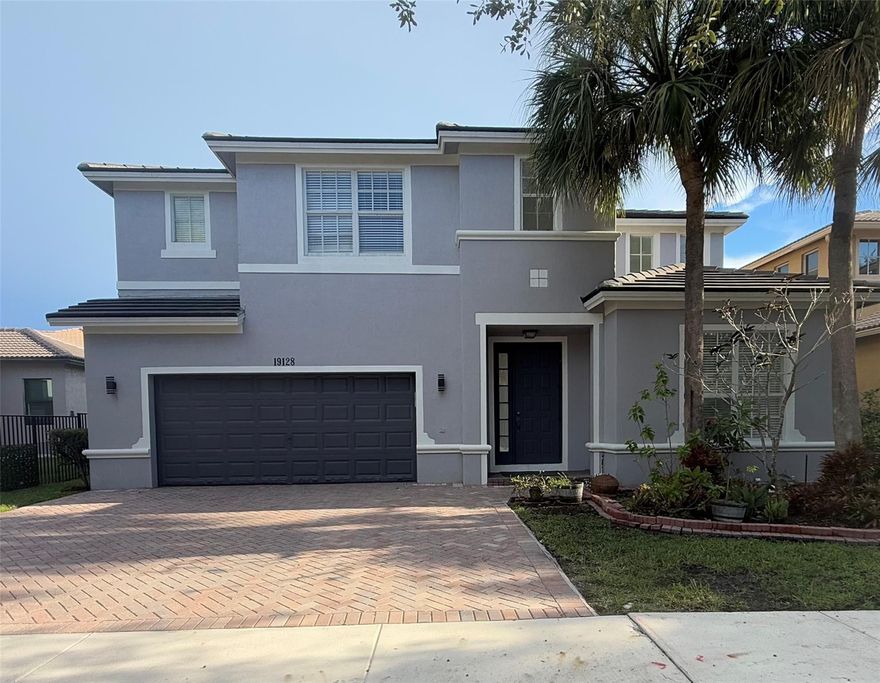 Location location this beautiful 5 bedroom, 4 bathroom home located in the most desirable Community  Isles at Weston, 1 bedroom 1 bathroom on the first floor, all other 4 bedroom and 3bathrooms are on the second floor. The bright kitchen features granite countertops, stainless steel appliances. With open patio over look to the lake. tile and laminate floor throughout.  HOA amenities include a clubhouse, 2 pools, gym, beach volleyball, basketball courts, and playground, internet and cable. Close to A-rated schools Manatee Bay (elementary) Falcon Cove (Middle school) Cypress Bay ( high school). Easy highways access, shopping, and dining all with in close distance.