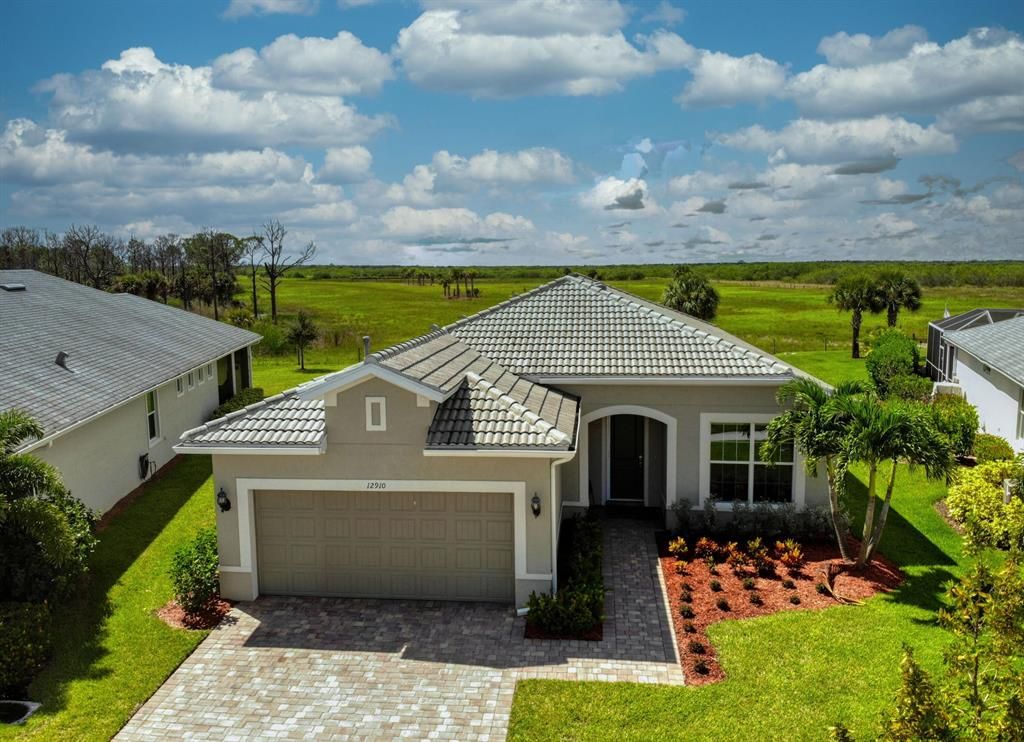 Photo of 12910 SW Aureolian Lane, Port Saint Lucie, FL 34987 (MLS # R10746191)