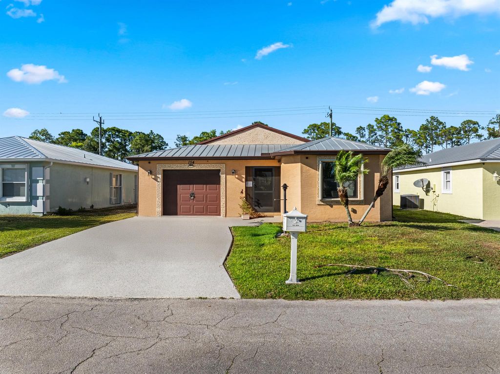 Photo of 154 Mediterranean Boulevard N, Port Saint Lucie, FL 34952 (MLS # R11072771)