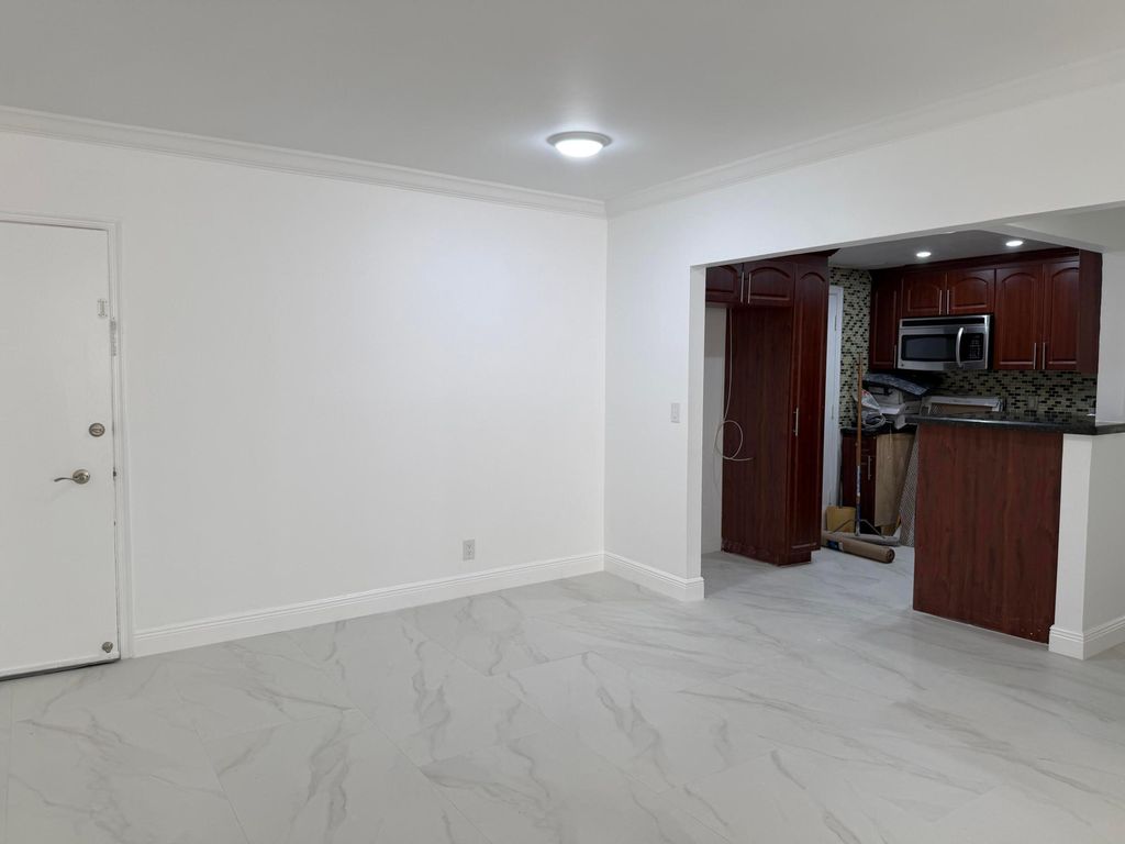 Photo of 2161 NE 68 Street NE #Unit 303, Fort Lauderdale, FL 33308 (MLS # B26015271)