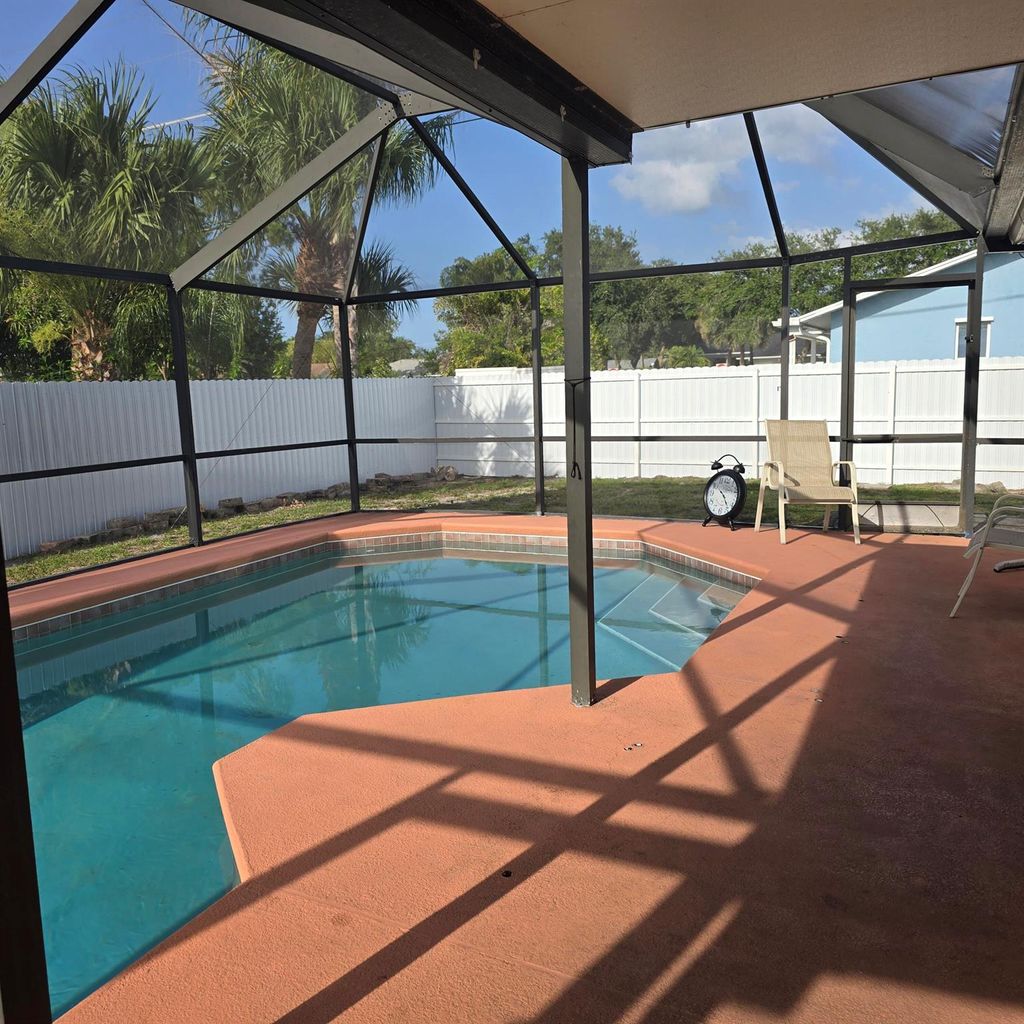 Photo of 1285 SE Port St Lucie Boulevard, Port Saint Lucie, FL 34952 (MLS # R11098068)