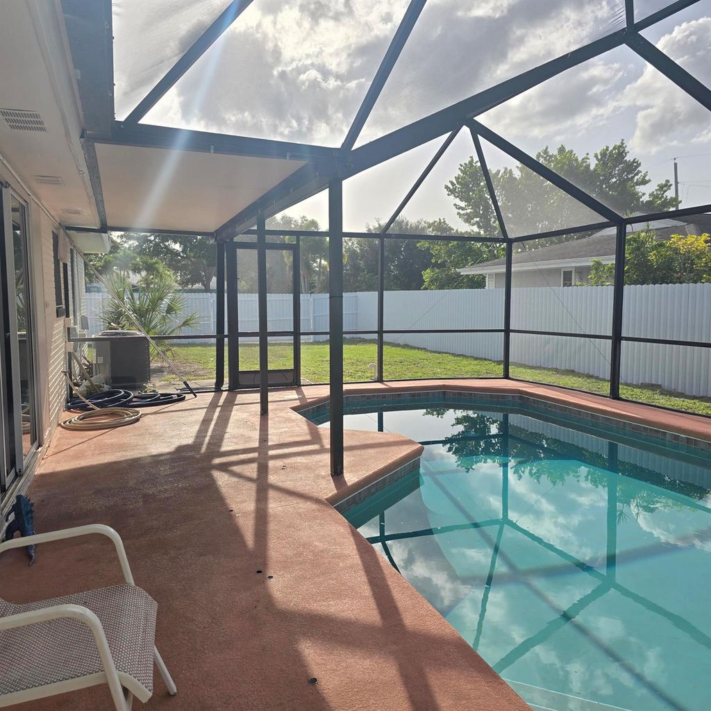 Photo of 1285 SE Port St Lucie Boulevard, Port Saint Lucie, FL 34952 (MLS # R11098068)