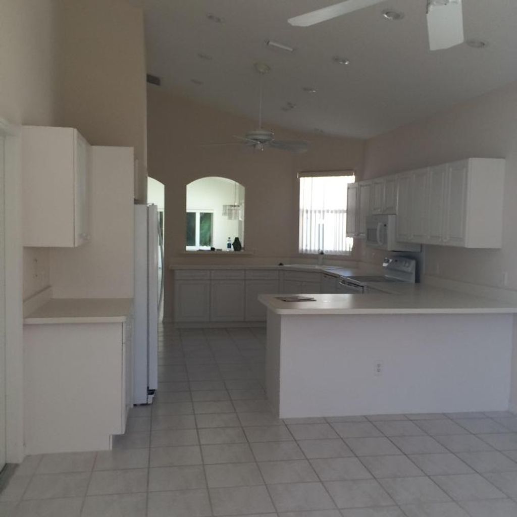 Photo of 152 Pepper Lane, Jensen Beach, FL 34957 (MLS # R10874727)