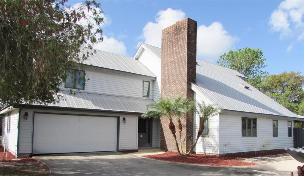 Photo of 674 SE Hidden River Drive, Port Saint Lucie, FL 34983 (MLS # R10703847)