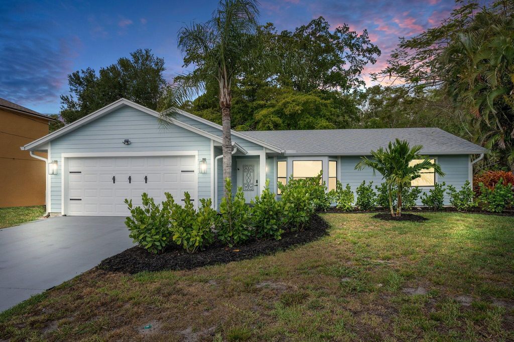 Photo of 411 SW Namoit Place, Port St Lucie, FL 34953 (MLS # R10986708)