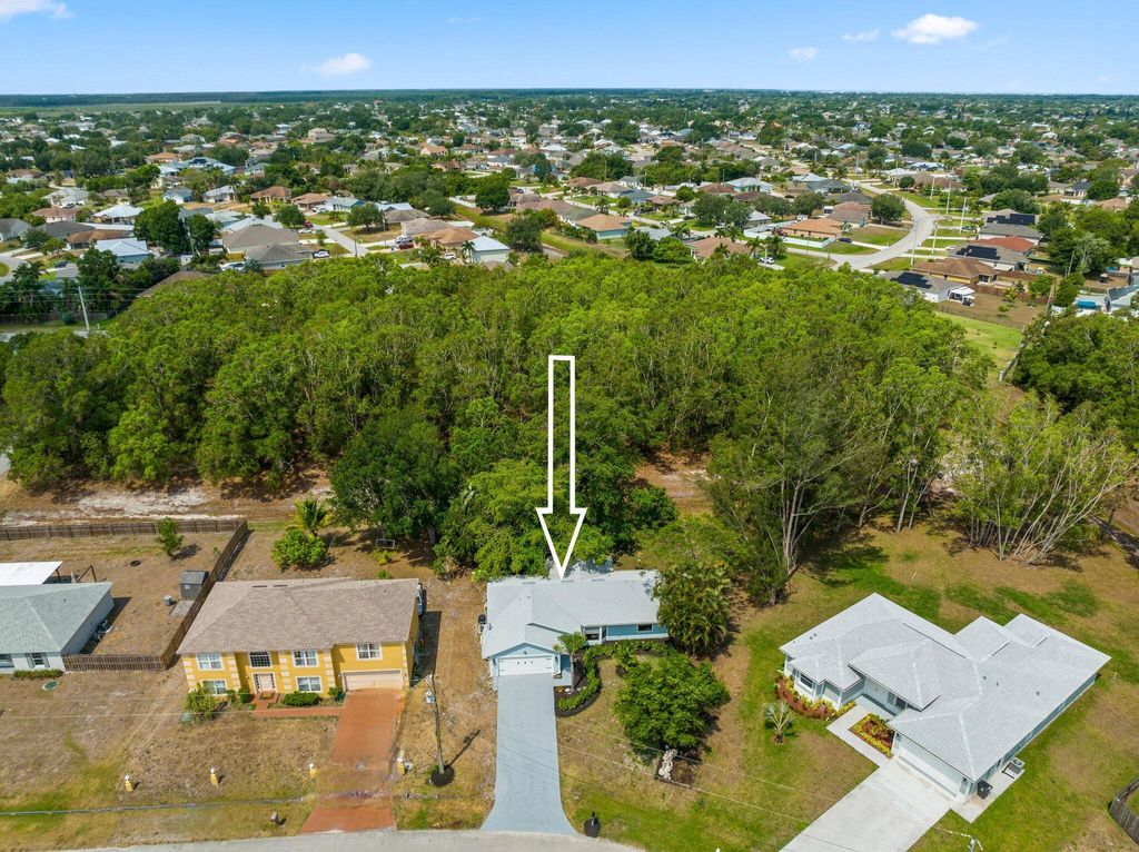 Photo of 411 SW Namoit Place, Port Saint Lucie, FL 34953 (MLS # R10986708)