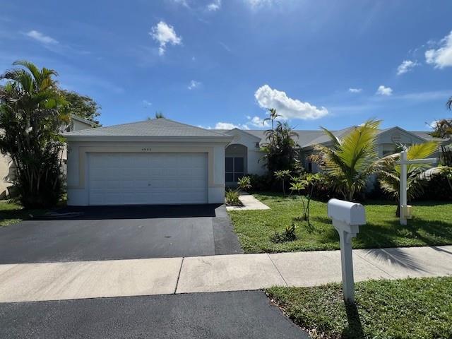 Spacious Davie Rental! Well-maintained 3-bedroom, 2-bathroom home featuring a bright open layout, kitchen with plenty of cabinet space, and comfortable living and dining areas. Primary bedroom includes ample closet space and private bath. Enjoy a large fenced backyard with screened patio, plus a garage and driveway parking. Conveniently located near schools, shopping, dining, and major highways.