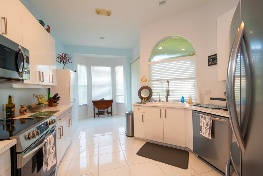 Photo of 645 SW Andros Circle, Port Saint Lucie, FL 34986 (MLS # R11128754)
