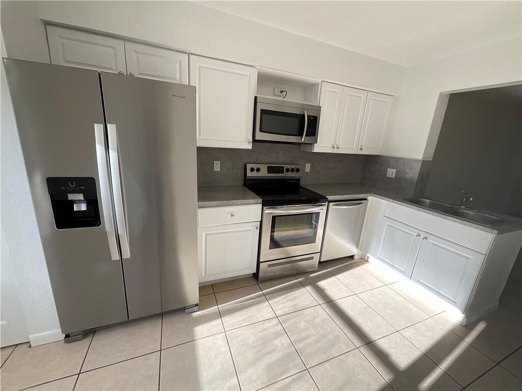 Photo of 11420 NW 43rd Street #1-4, Coral Springs, FL 33065 (MLS # R11030586)